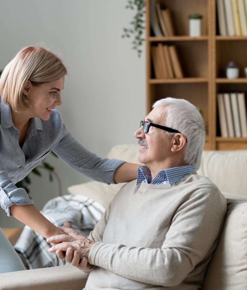 An older woman smiling at home